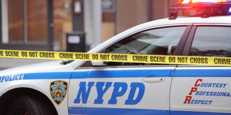 A general view of crime scene do not cross tape near an NYPD car in New York, NY on July 28 2017.