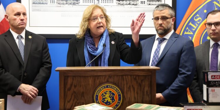 District Attorney Anne T. Donnelly and Nassau County Police Commissioner Patrick Ryder addressing the media about a multi-million-dollar money laundering investigation in Mineola, NY