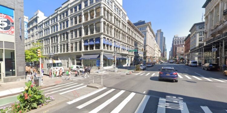 A “disheveled lunatic” allegedly used a metal rod to smash the head of a pregnant woman on Tuesday afternoon.