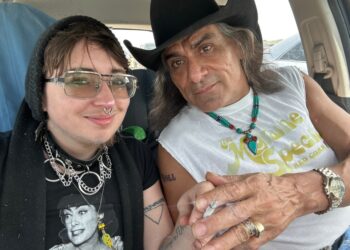 Jonathan Joss and his husband, Tristan Kern de Gonzales, in a car.