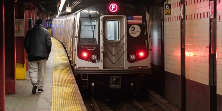 A general view of an F subway train the Herald Square subway station in New York, NY on May 8, 2020.