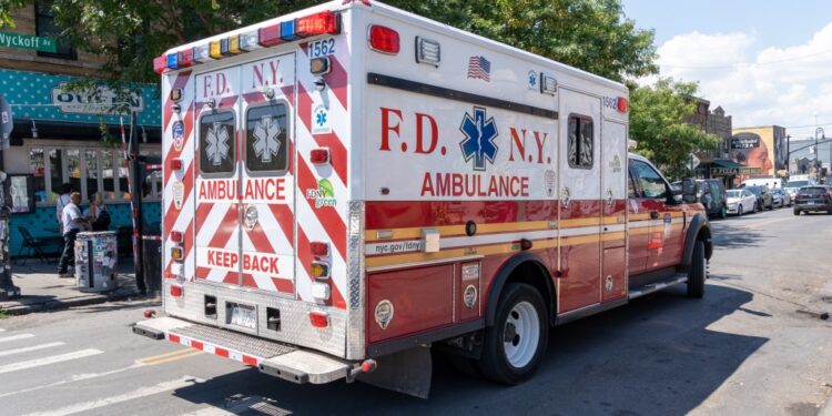 FDNY ambulance parked on a city street.