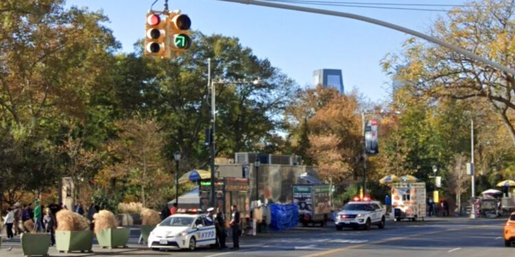 NYPD officers at a crime scene in the Financial District neighborhood of Manhattan