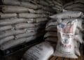 Sacks of USAID yellow peas in a storage facility.