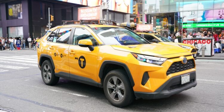A general view of yellow taxis or yellow cabs as seen in the Times Square section of New York, NY on June 13, 2025.
