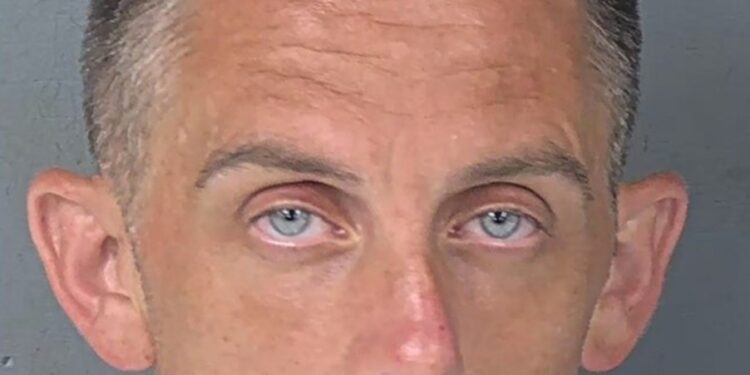 Christopher Spain, 38, was arrested for DUI on lawn mower.