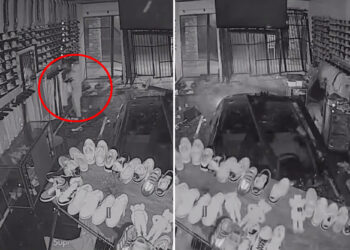 Hooded thief caught on camera plowing stolen car into Phoenix streetwear store before making off with designer clothes