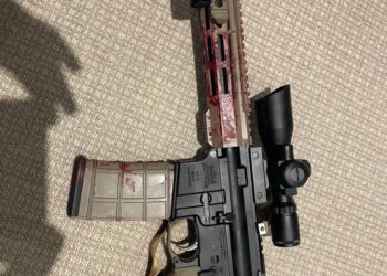 Blood-stained AR-15 rifle.