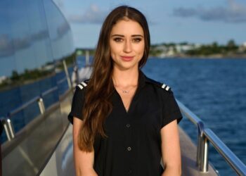 Portrait of Paige Bell, a stewardess on a yacht.