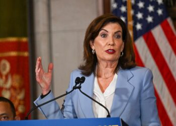 Gov. Kathy Hochul speaking at a podium.