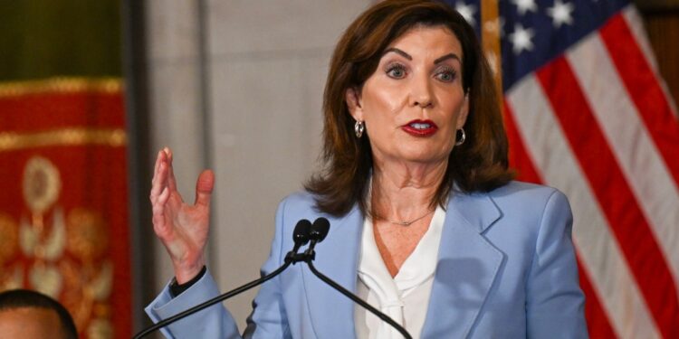 Gov. Kathy Hochul speaking at a podium.