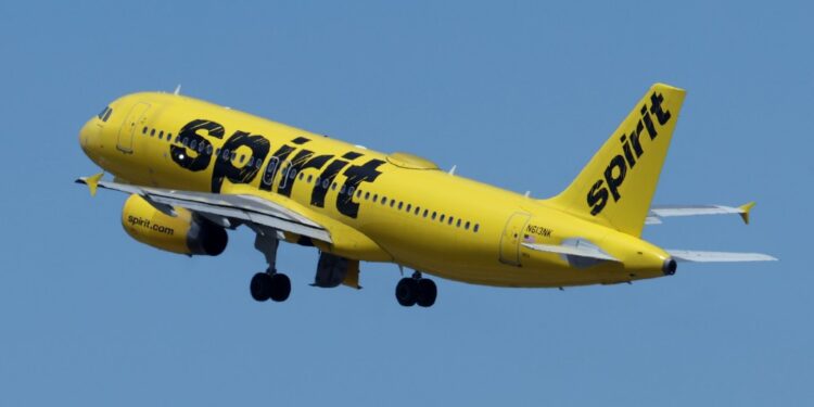 A Spirit Airlines plane taking off.