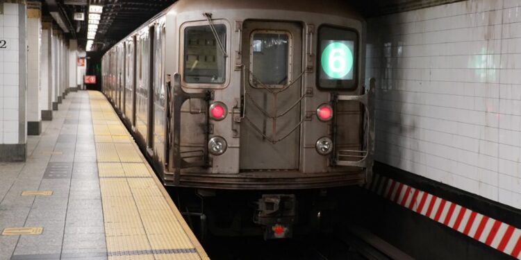 A general view of subway trains and straphangers wearing face masks at Grand Central Terminal in New York, NY on November 21, 2020.