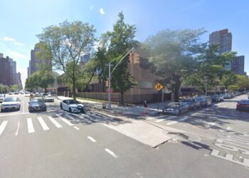 The victim and his son were riding in the bike lane at East 97th Street and 1st Avenue around 6 p.m. Wednesday when the driver of a black sedan made a left turn, nearly striking the son, cops said.