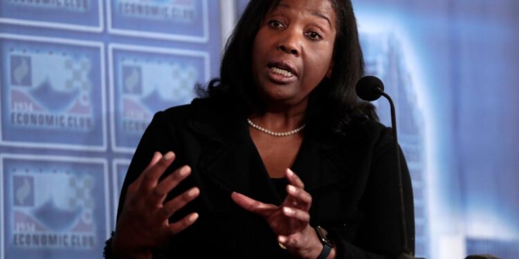 Lisa Cook, Federal Reserve Governor, speaking at a podium.A grand jury in Atlanta is looking into Cook