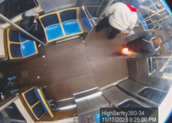 Surveillance video captured a train rider identified as Lawrence Reed holding a flaming bottle before his fire attack on Nov. 17, 2025.