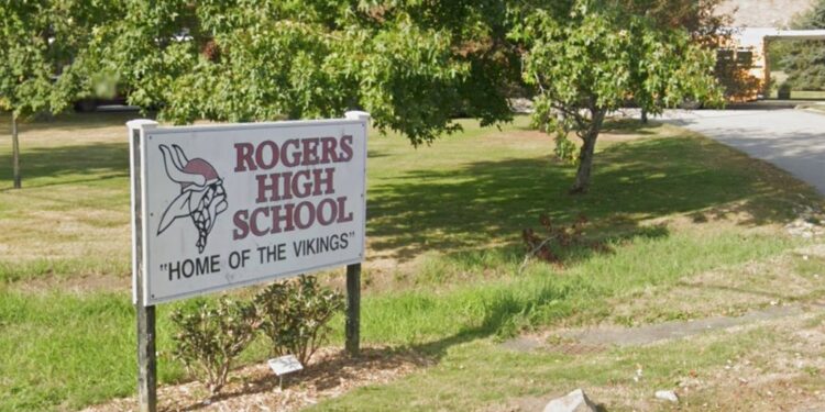 Sign for Rogers High School, "Home of the Vikings."
