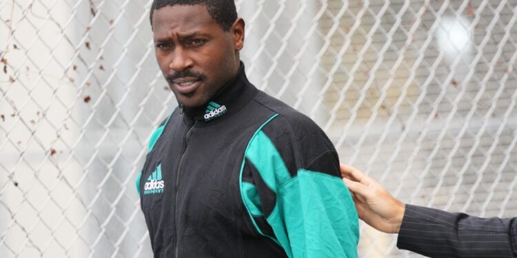 Former NFL star wide receiver Antonio Brown walks after being released from the Turner Guilford Knight Correctional Center, Nov. 13, 2025, in Miami.